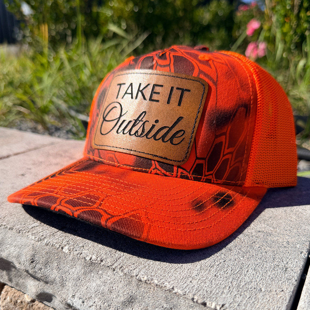 Take It Outside – Kryptek Blaze Orange Camo Trucker Hat