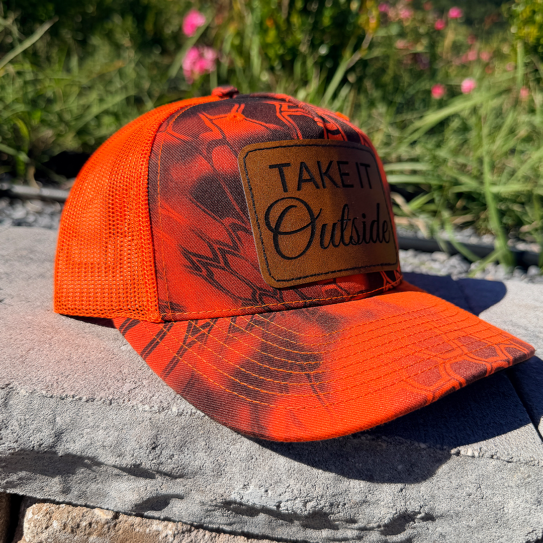 Take It Outside – Kryptek Blaze Orange Camo Trucker Hat