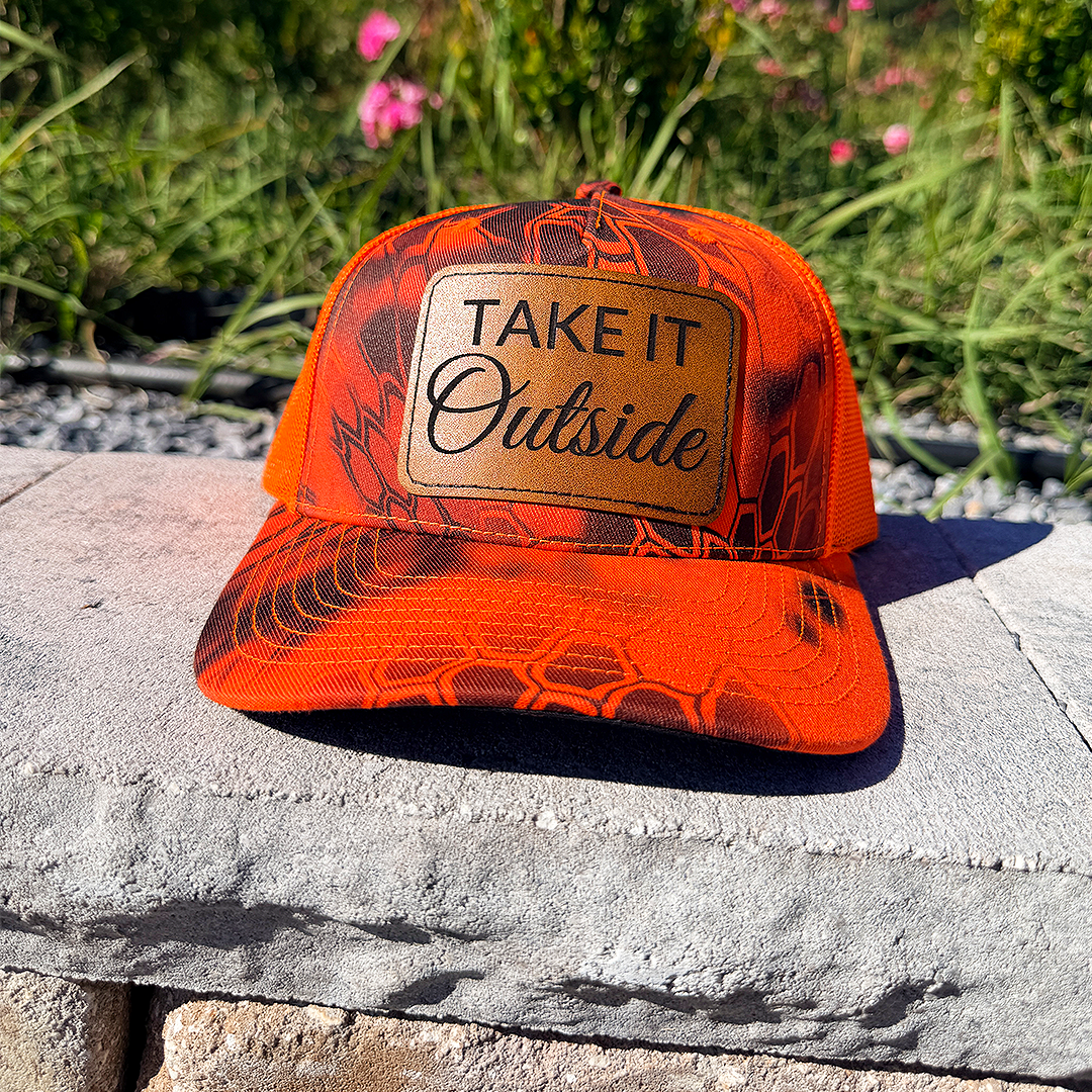 Take It Outside – Kryptek Blaze Orange Camo Trucker Hat
