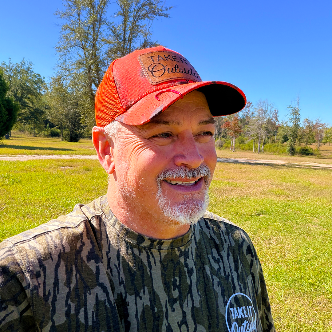 Take It Outside – Kryptek Blaze Orange Camo Trucker Hat