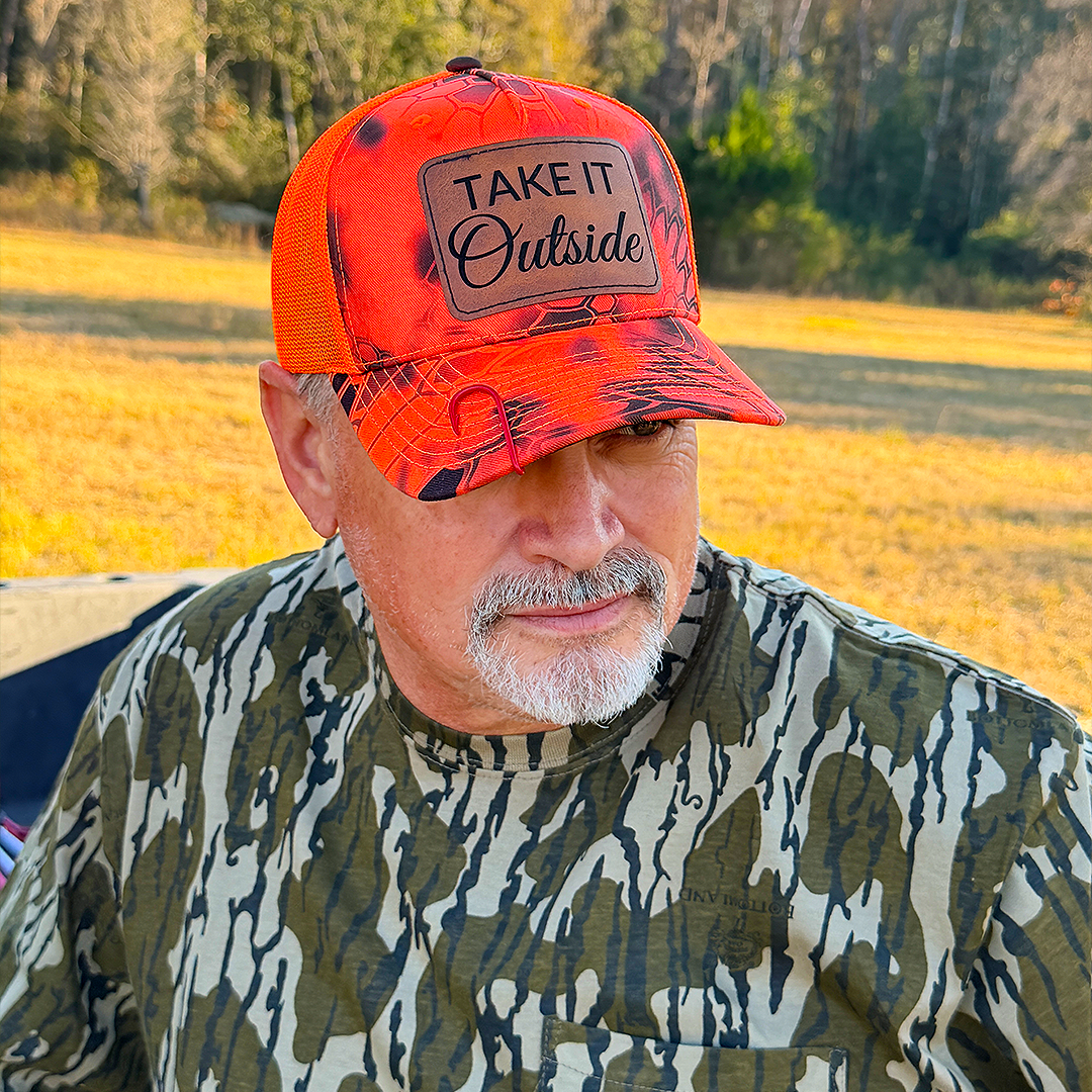 Take It Outside – Kryptek Blaze Orange Camo Trucker Hat
